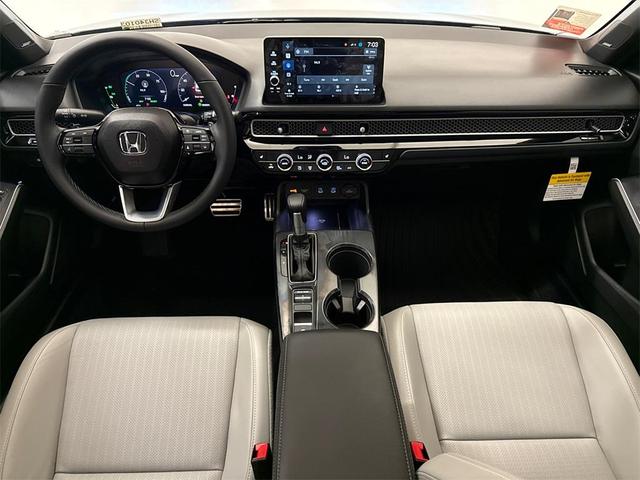 Photo of 2025 Blue Lagoon Honda Civic Hybrid