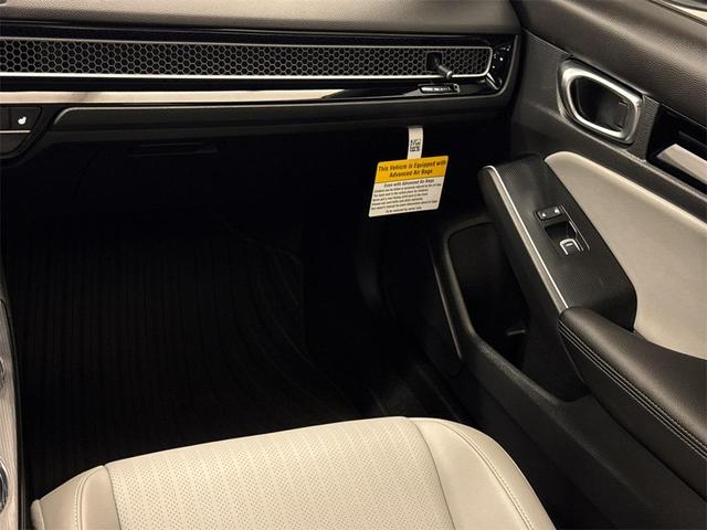 Photo of 2025 Blue Lagoon Honda Civic Hybrid