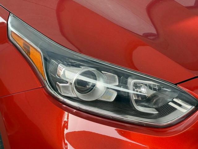 Photo of 2021 Fire Orange Kia Forte