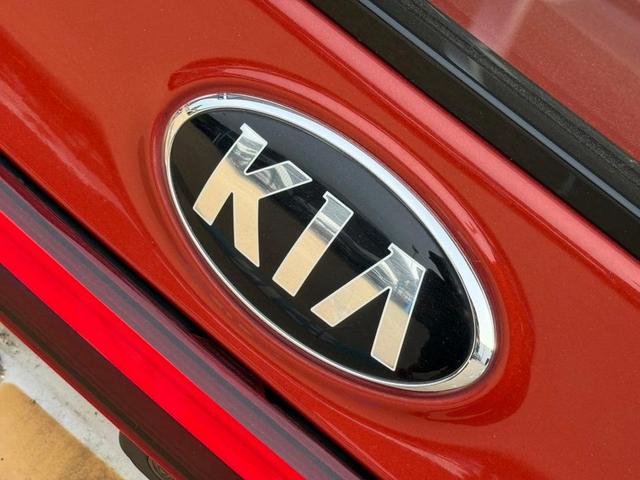Photo of 2021 Fire Orange Kia Forte