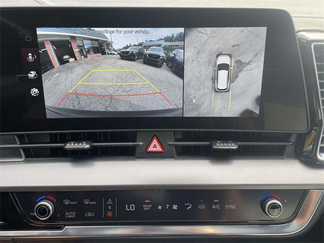 Photo of 2023 Vesta Blue Kia Sportage Hybrid