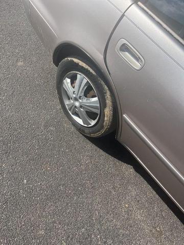 Photo of 2001 Sandrift Metallic Toyota Corolla