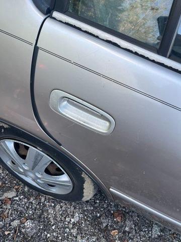 Photo of 2001 Sandrift Metallic Toyota Corolla