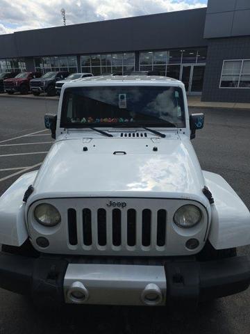 Photo of 2014 Bright White Jeep Wrangler Unlimited