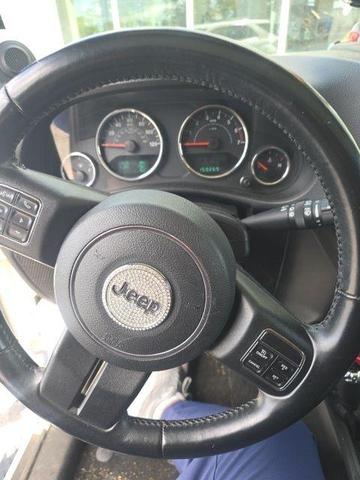Photo of 2014 Bright White Jeep Wrangler Unlimited