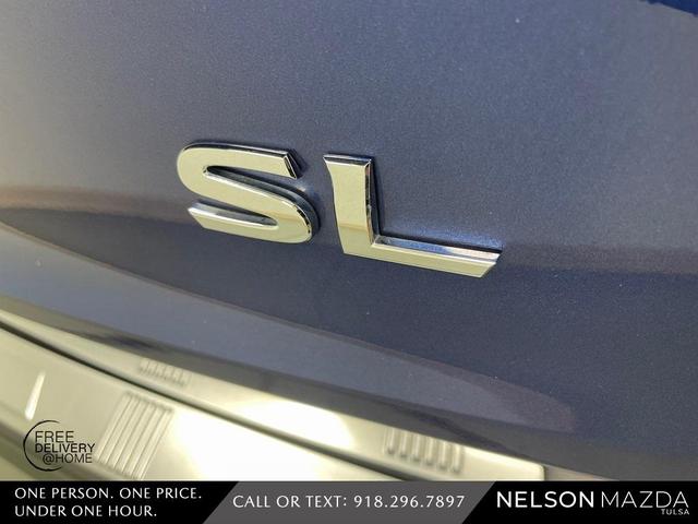 Photo of 2022 Blue / Black Nissan Rogue