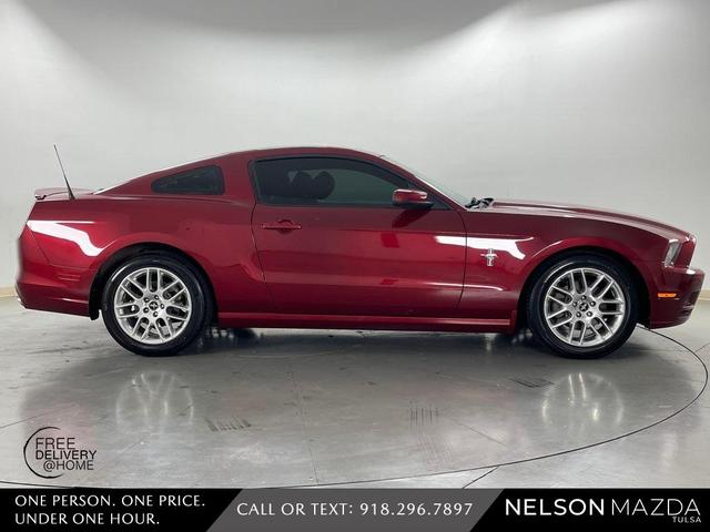 Photo of 2014 Ruby Red Metallic Ford Mustang
