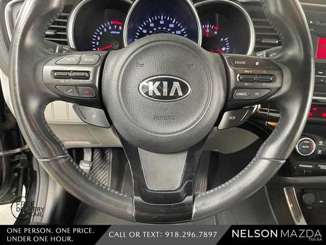 Photo of 2014 Ebony Black Kia Optima
