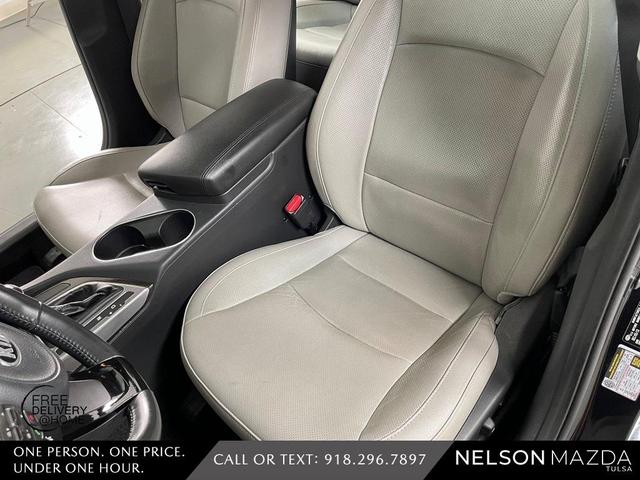 Photo of 2014 Ebony Black Kia Optima