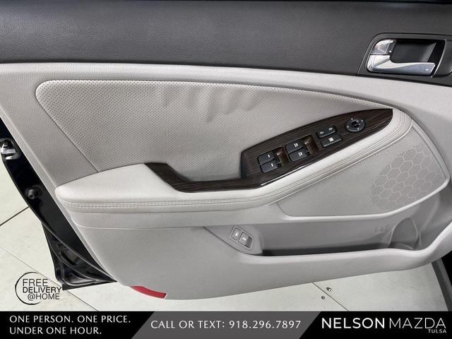 Photo of 2014 Ebony Black Kia Optima
