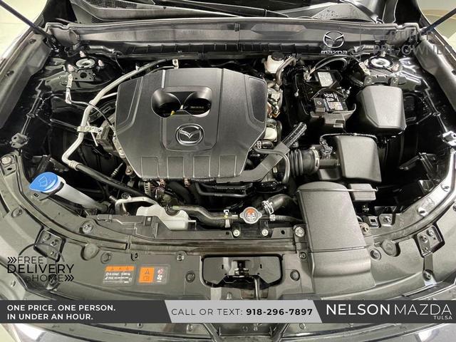 Photo of 2025 Jet Black Mica Mazda CX-50