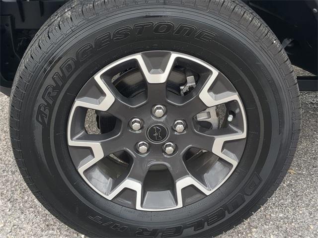 Photo of 2024 Earl Clearcoat Jeep Wrangler