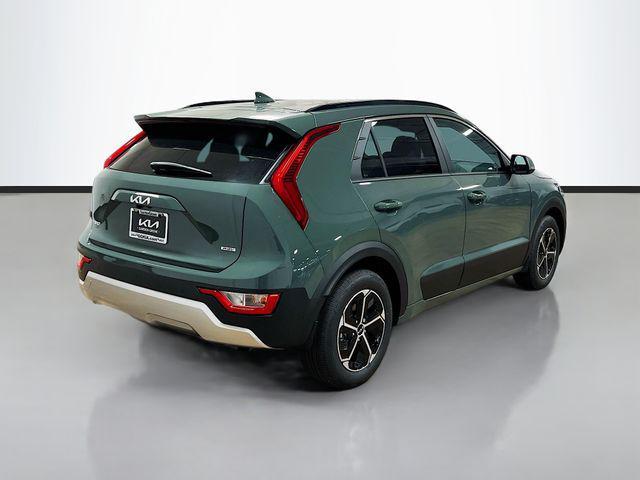 Photo of 2025 Cityscape Green Kia Niro Plug-In Hybrid