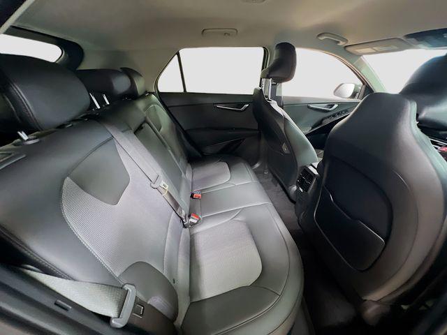 Photo of 2025 Cityscape Green Kia Niro Plug-In Hybrid