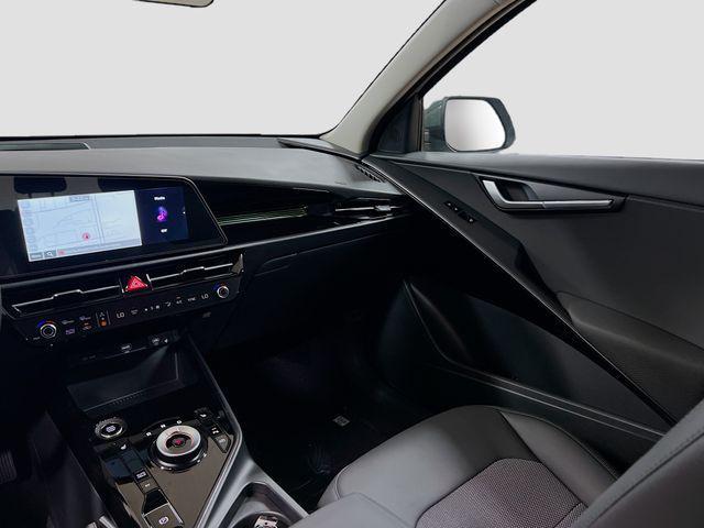 Photo of 2025 Cityscape Green Kia Niro Plug-In Hybrid