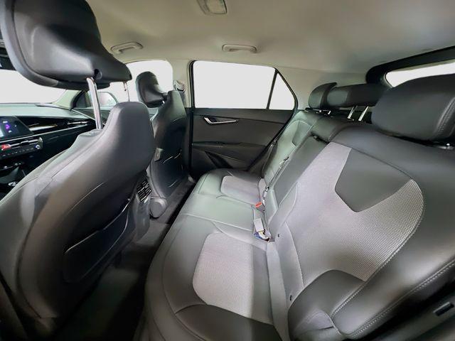 Photo of 2025 Cityscape Green Kia Niro Plug-In Hybrid