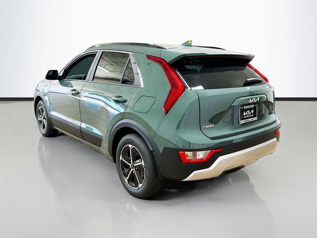 Photo of 2025 Cityscape Green Kia Niro Plug-In Hybrid