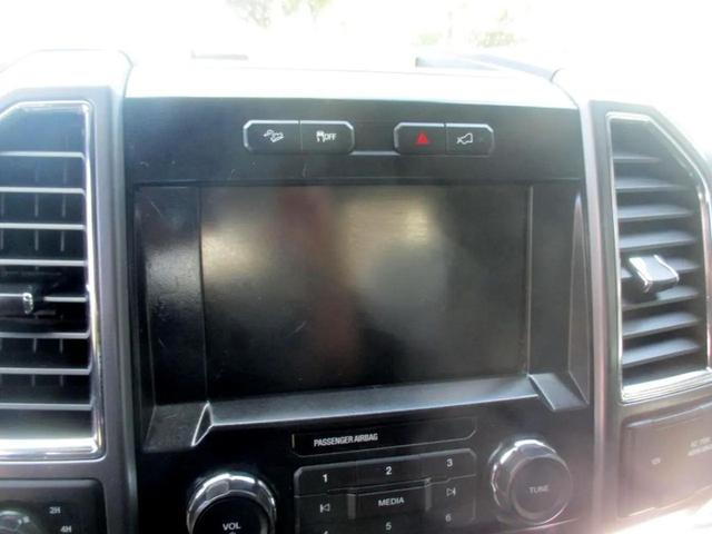 Photo of 2015 Burgundy Ford F-150