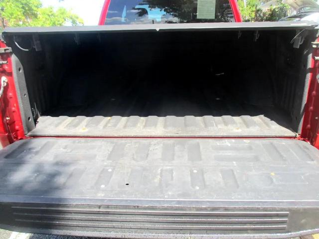 Photo of 2015 Burgundy Ford F-150