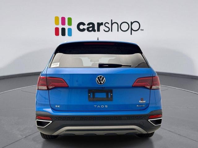 Photo of 2022 Cornflower Blue Volkswagen Taos