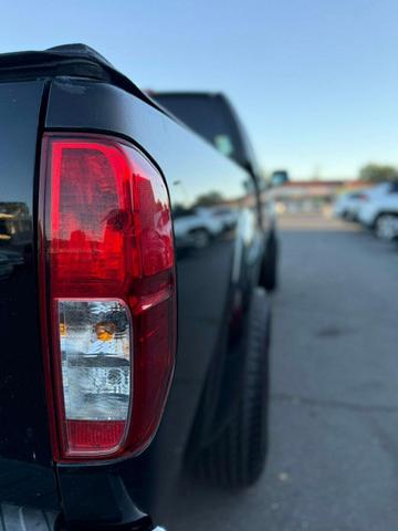 Photo of 2013 Super Black Nissan Frontier