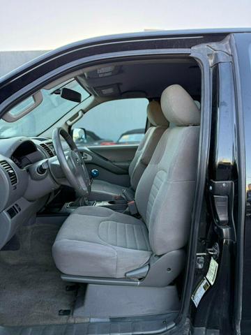 Photo of 2013 Super Black Nissan Frontier