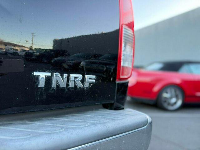 Photo of 2013 Super Black Nissan Frontier
