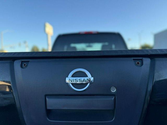 Photo of 2013 Super Black Nissan Frontier