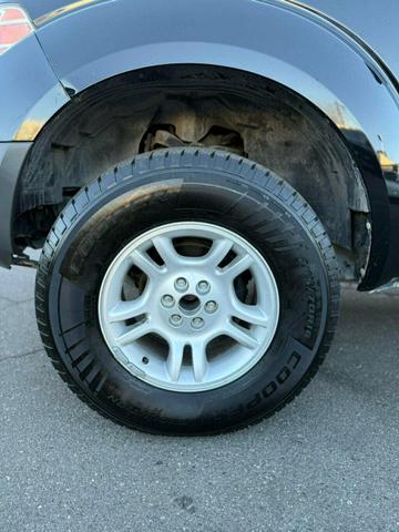 Photo of 2013 Super Black Nissan Frontier