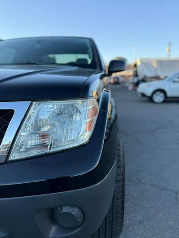 Photo of 2013 Super Black Nissan Frontier