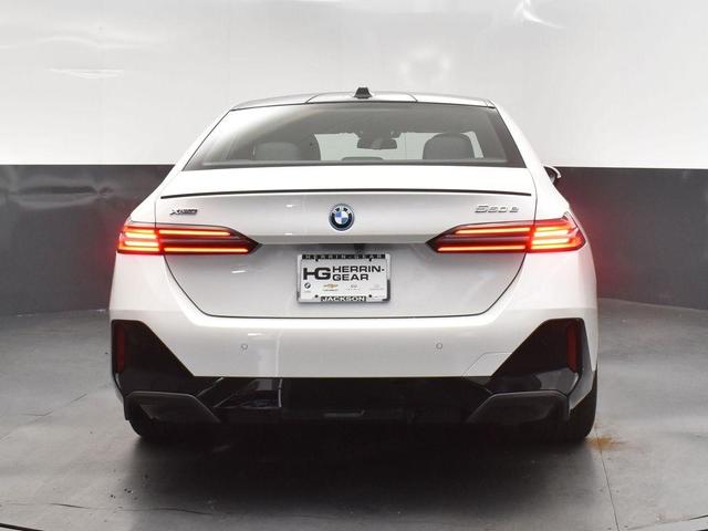 Photo of 2026 Mineral White Metallic BMW 550e