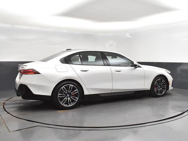 Photo of 2026 Mineral White Metallic BMW 550e