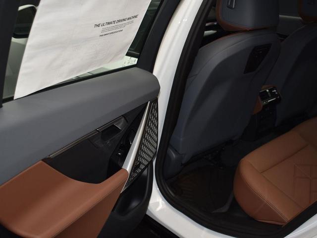Photo of 2026 Mineral White Metallic BMW 550e