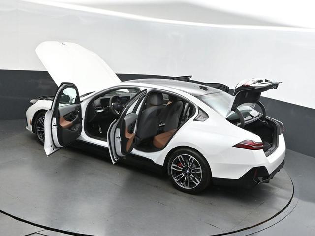 Photo of 2026 Mineral White Metallic BMW 550e