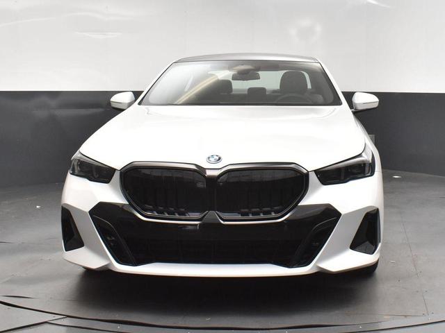 Photo of 2026 Mineral White Metallic BMW 550e