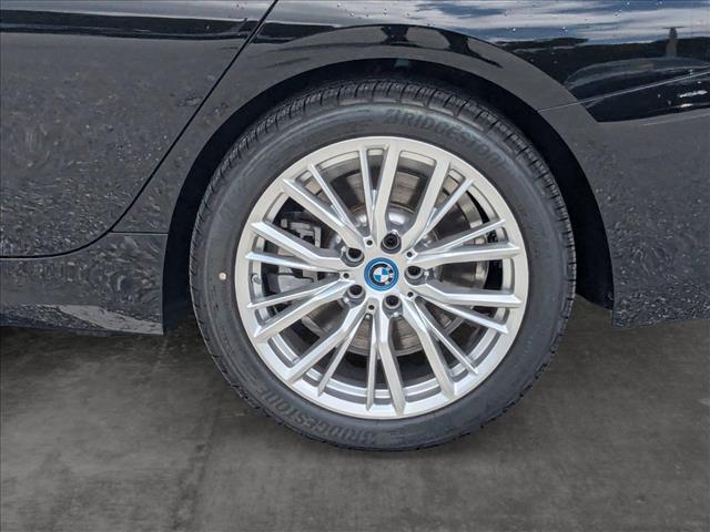 Photo of 2024 Jet Black BMW 330e