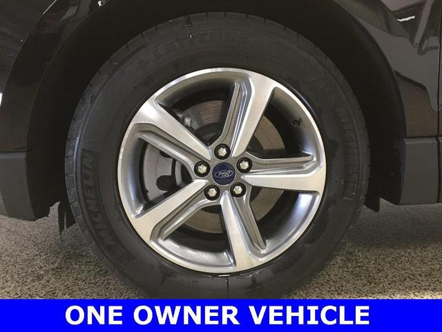 Photo of 2021 Agate Black Metallic Ford Edge