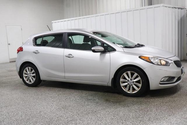 Photo of 2015 Bright Silver Kia Forte