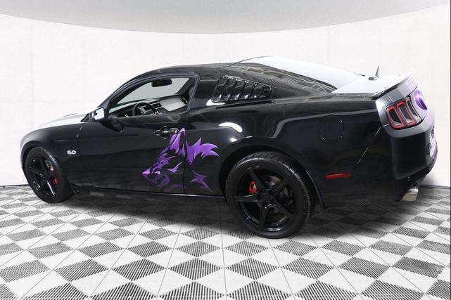 Photo of 2014 Black Ford Mustang