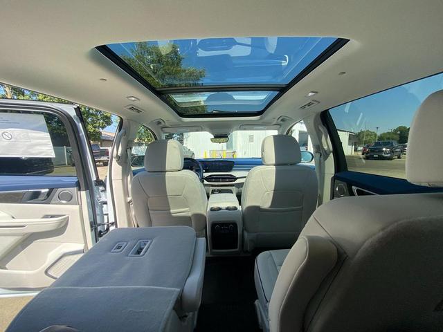 Photo of 2026 iridescent white tricoat Buick Enclave