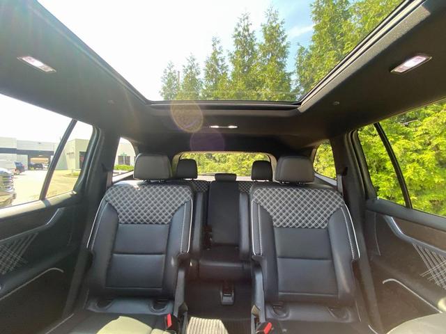 Photo of 2024 Volcanic Red Tintcoat GMC Acadia