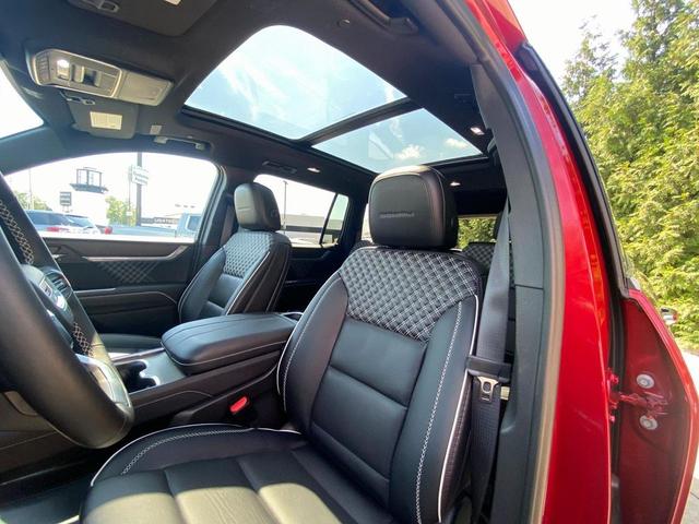 Photo of 2024 Volcanic Red Tintcoat GMC Acadia