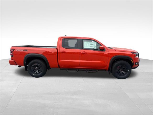 Photo of 2025 Afterburn Orange Nissan Frontier