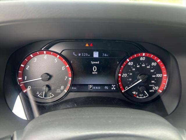 Photo of 2025 Afterburn Orange Nissan Frontier