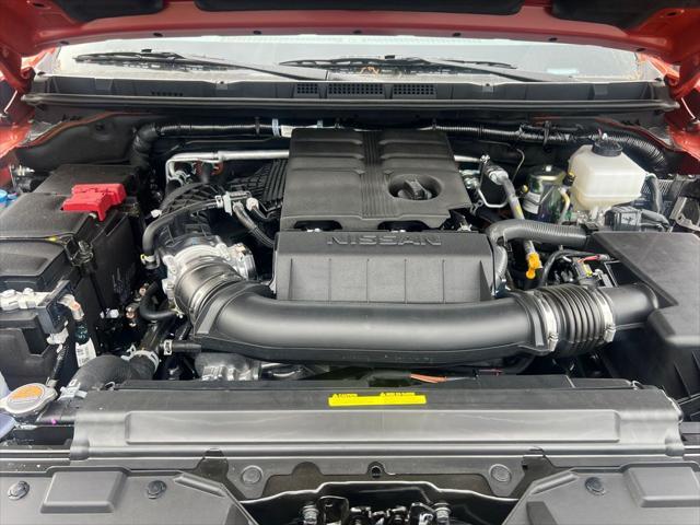 Photo of 2025 Afterburn Orange Nissan Frontier
