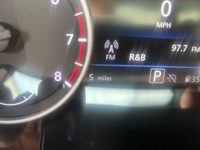 Photo of 2025 Aspen White Tricoat/Super Black Nissan Sentra