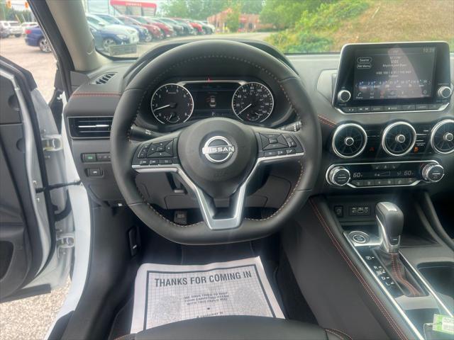 Photo of 2025 Aspen White Tricoat/Super Black Nissan Sentra