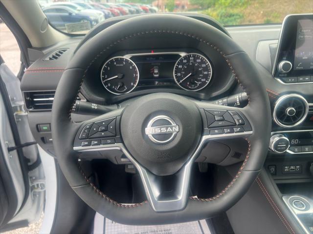 Photo of 2025 Aspen White Tricoat/Super Black Nissan Sentra