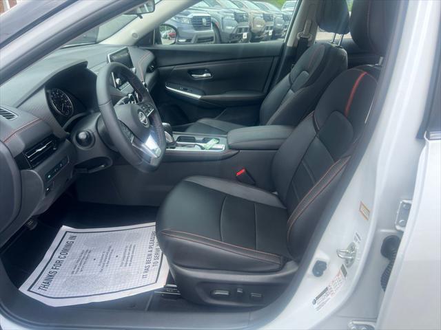 Photo of 2025 Aspen White Tricoat/Super Black Nissan Sentra