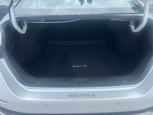 Photo of 2025 Aspen White Tricoat/Super Black Nissan Sentra